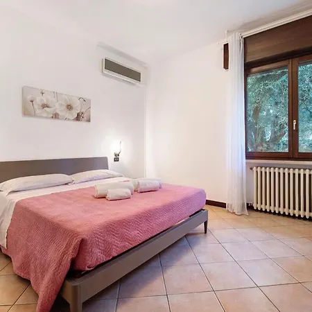 Апартаменты Memy's House Trilocale Con Giardino